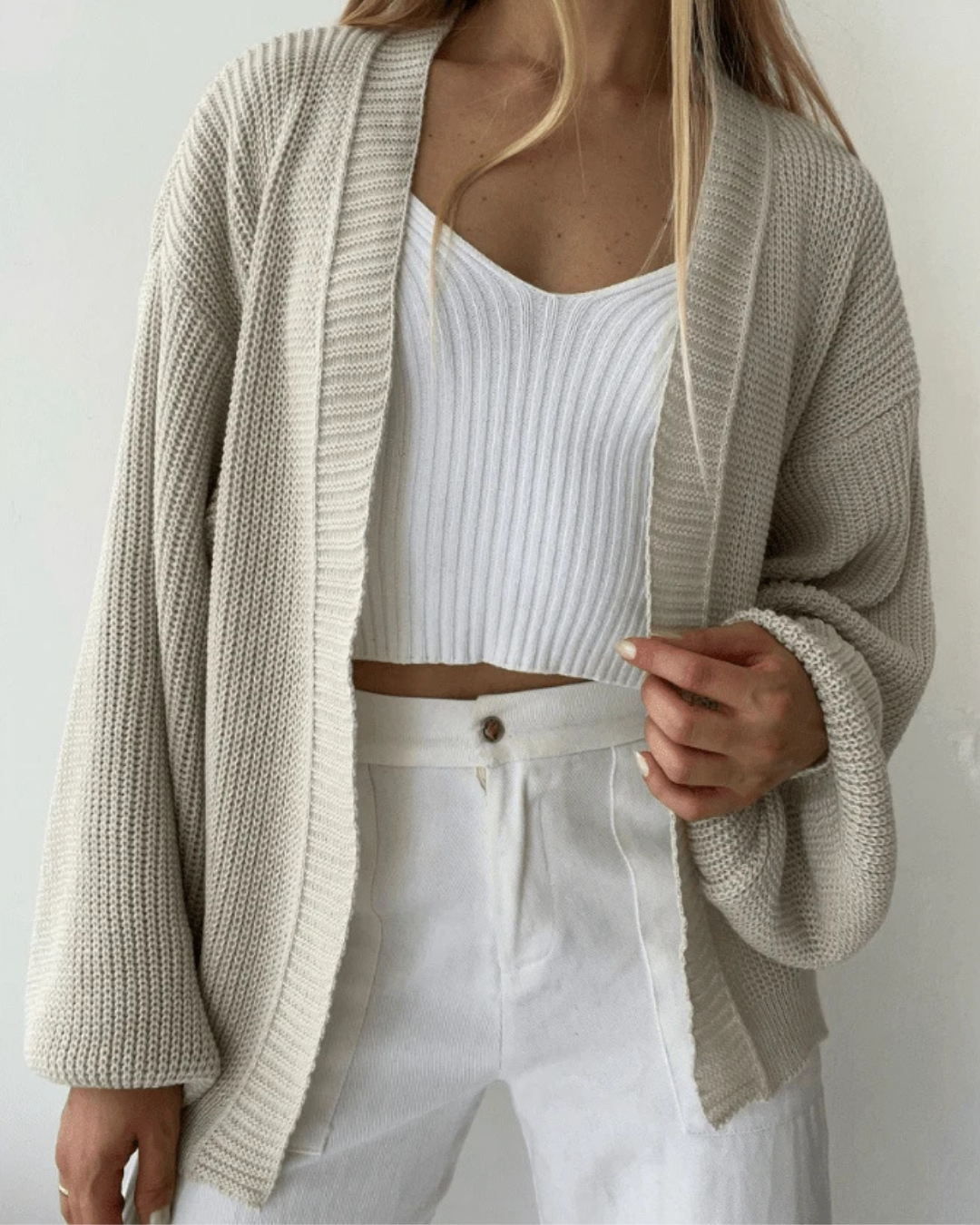 Casaco Tricot Básico com Manga Bufante | Elegância e Conforto para o Dia a Dia