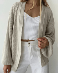 Casaco Tricot Básico com Manga Bufante | Elegância e Conforto para o Dia a Dia