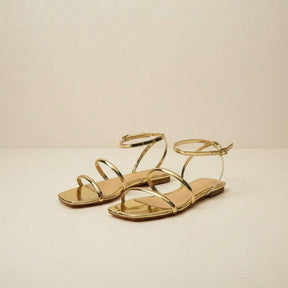 Sandália Feminina Rasteira Bico Quadrado com Tiras e Fechamento no Tornozelo Dourada